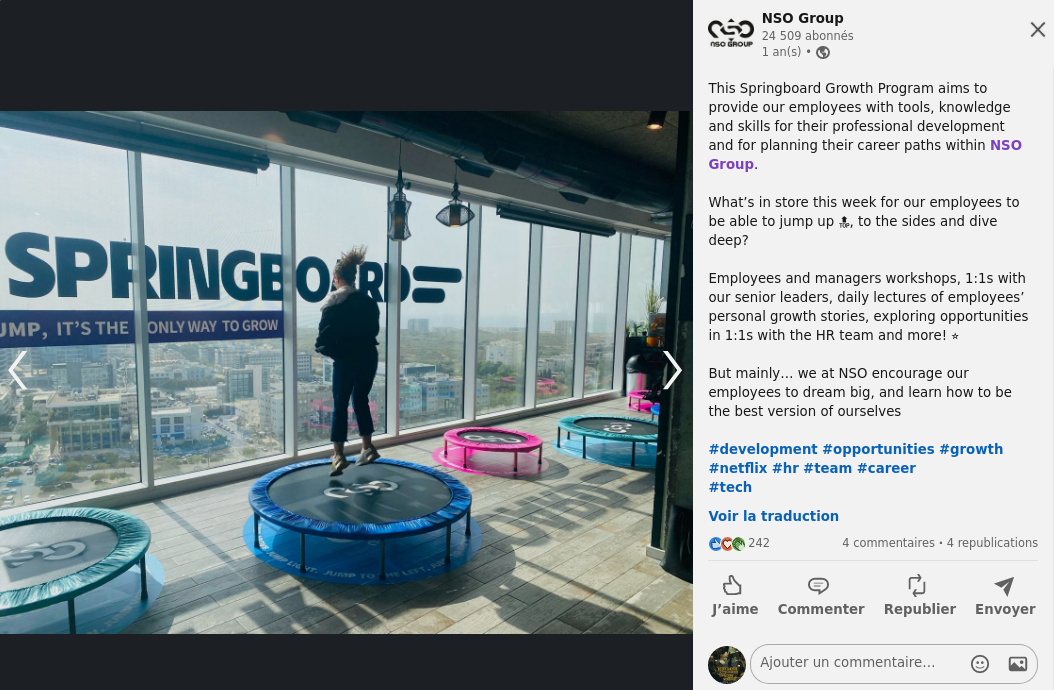 Photo partagée sur LinkedIn par NSO de trampolines aux couleurs de l'entreprise installés dans ses locaux